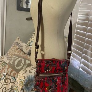 Women’s patterned Sakroot’s crossbody bag